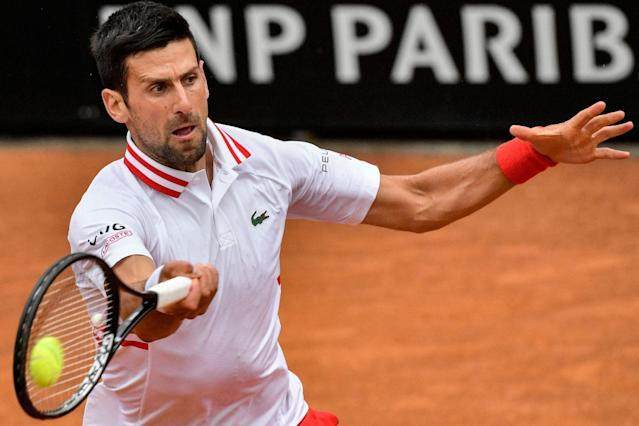 1620784398679020463.jpg 足球直播平台-德约罗马站雨后惊险闯关 状态起伏大法网真悬了?